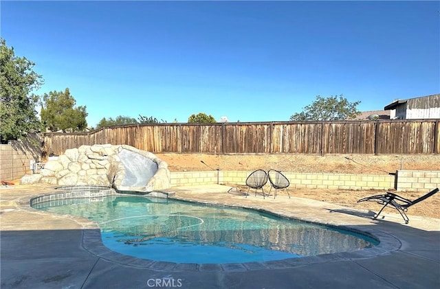 12649 Mesa Linda Ave, Victorville, CA 92392 - view of swimming pool with a fenced backyard, a pool with connected hot tub, and a patio