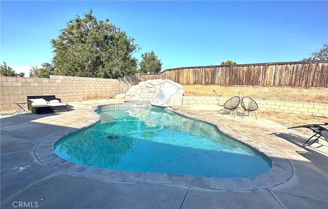 12649 Mesa Linda Ave, Victorville, CA 92392 - view of swimming pool featuring a fenced backyard and a patio