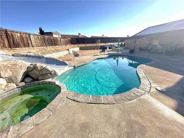 12649 Mesa Linda Ave, Victorville, CA 92392 - view of swimming pool featuring a patio, a fenced backyard, and a pool with connected hot tub