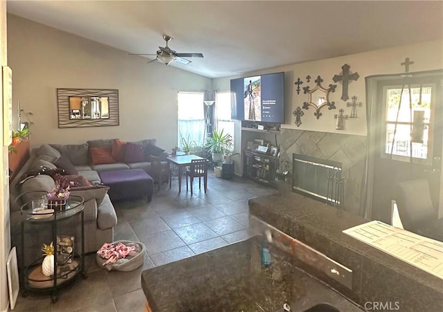 12649 Mesa Linda Ave, Victorville, CA 92392 - living area with plenty of natural light, ceiling fan, lofted ceiling, and tile patterned flooring