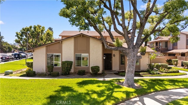 1456 Countrywood Ave Unit 14, Hacienda Heights, CA 91745 - view of front of house featuring a front yard and stucco siding