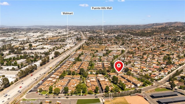1456 Countrywood Ave Unit 14, Hacienda Heights, CA 91745 - aerial overview of property's location with nearby suburban area and a highway