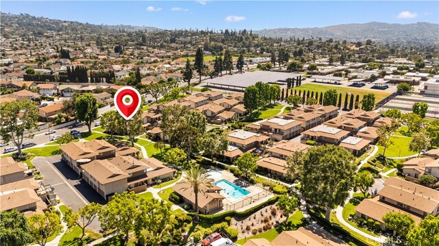 1456 Countrywood Ave Unit 14, Hacienda Heights, CA 91745 - aerial perspective of suburban area featuring a pool and mountains