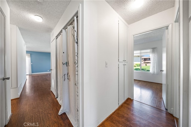 1456 Countrywood Ave Unit 14, Hacienda Heights, CA 91745 - hallway featuring a textured ceiling and wood finished floors