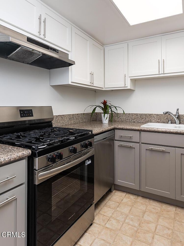 837 Magnolia Ave Unit 12, Pasadena, CA 91106 - kitchen with stainless steel appliances, ventilation hood, gray cabinets, and white cabinets