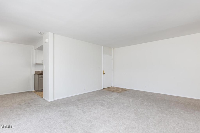 837 Magnolia Ave Unit 12, Pasadena, CA 91106 - spare room featuring light colored carpet and a smoke detector