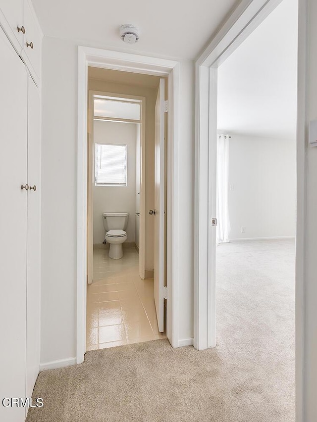 837 Magnolia Ave Unit 12, Pasadena, CA 91106 - hallway featuring light colored carpet and light tile patterned flooring