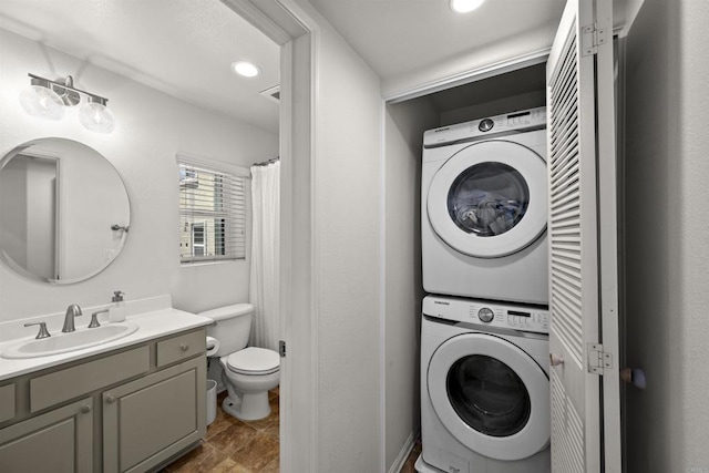 7715 El Cajon Blvd Unit 5, La Mesa, CA 91942 - bathroom featuring estacked washer and dryer, vanity, recessed lighting, and a shower with curtain