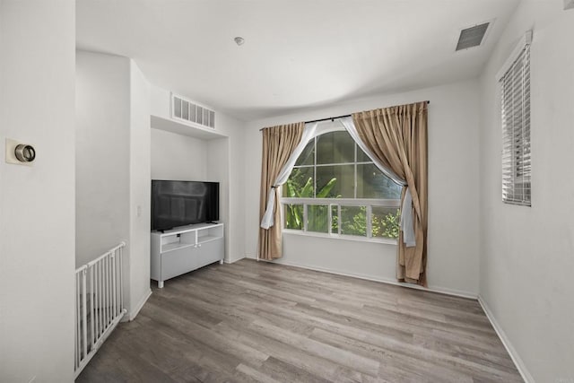 7715 El Cajon Blvd Unit 5, La Mesa, CA 91942 - unfurnished living room with wood finished floors