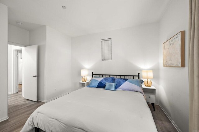 7715 El Cajon Blvd Unit 5, La Mesa, CA 91942 - bedroom with wood finished floors and baseboards
