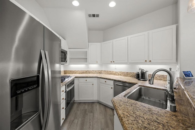 7715 El Cajon Blvd Unit 5, La Mesa, CA 91942 - kitchen with appliances with stainless steel finishes, light stone counters, open shelves, white cabinetry, and recessed lighting
