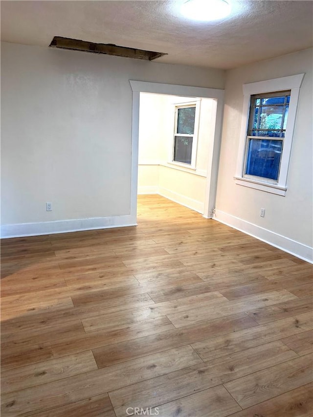170 N Holliston Ave Unit 5, Pasadena, CA 91106 - unfurnished room featuring wood finished floors and a textured ceiling
