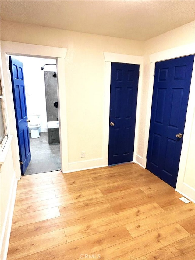 170 N Holliston Ave Unit 5, Pasadena, CA 91106 - entryway featuring light wood-type flooring and baseboards