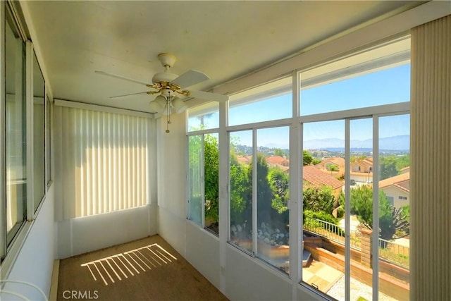 18431 Dancy St, Rowland Heights, CA 91748 - unfurnished sunroom featuring ceiling fan and a mountain view