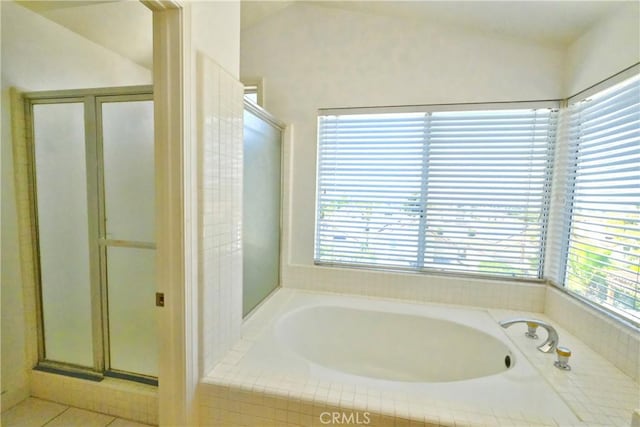 18431 Dancy St, Rowland Heights, CA 91748 - full bath featuring plenty of natural light, a bath, and a shower stall