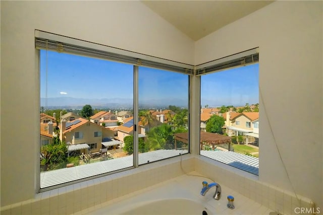 18431 Dancy St, Rowland Heights, CA 91748 - bathroom with a residential view, a garden tub, and lofted ceiling