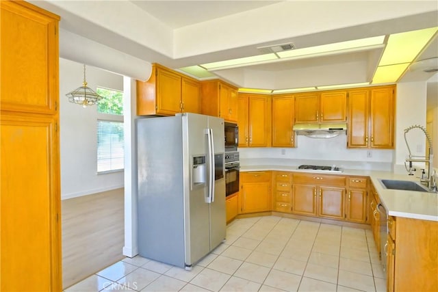 18431 Dancy St, Rowland Heights, CA 91748 - kitchen featuring black appliances, light countertops, light tile patterned flooring, a raised ceiling, and under cabinet range hood