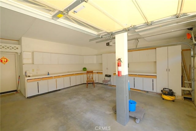 18431 Dancy St, Rowland Heights, CA 91748 - garage featuring a garage door opener