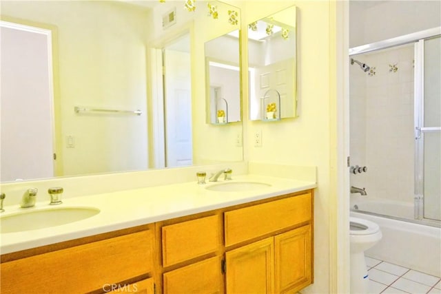 18431 Dancy St, Rowland Heights, CA 91748 - bathroom featuring double vanity, tile patterned flooring, and shower / bath combination with glass door