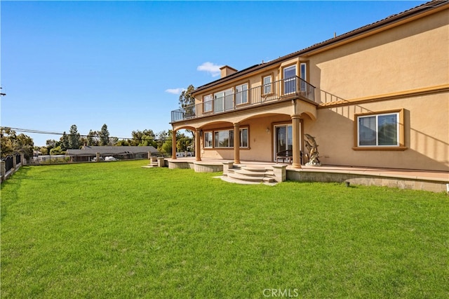 4642 Ohio St, Yorba Linda, CA 92886 - back of property featuring a balcony, a patio area, a chimney, and stucco siding