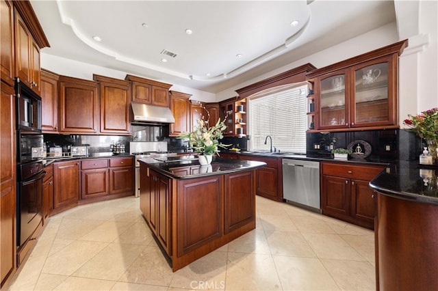 4642 Ohio St, Yorba Linda, CA 92886 - kitchen with stainless steel dishwasher, black oven, under cabinet range hood, light tile patterned flooring, and recessed lighting
