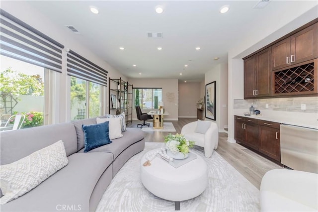 195 Stellar, Irvine, CA 92618 - living room with light wood-style floors and recessed lighting