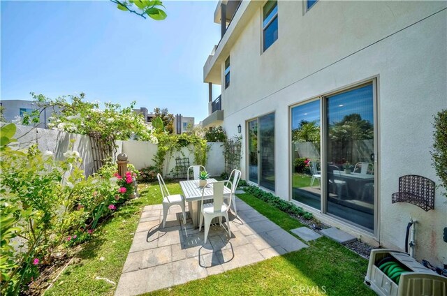 195 Stellar, Irvine, CA 92618 - fenced backyard with a patio and outdoor dining space