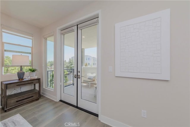 195 Stellar, Irvine, CA 92618 - entryway featuring wood finished floors and french doors