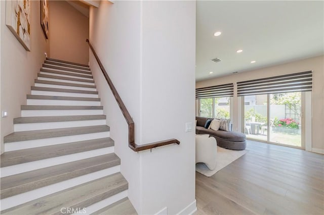 195 Stellar, Irvine, CA 92618 - stairway featuring wood finished floors and recessed lighting