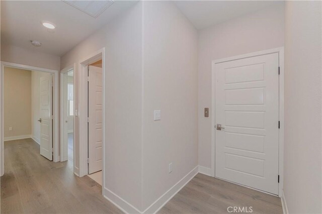 195 Stellar, Irvine, CA 92618 - corridor with light wood-style floors and baseboards