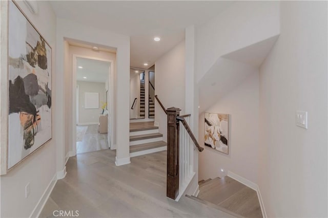 195 Stellar, Irvine, CA 92618 - stairs with wood finished floors and recessed lighting