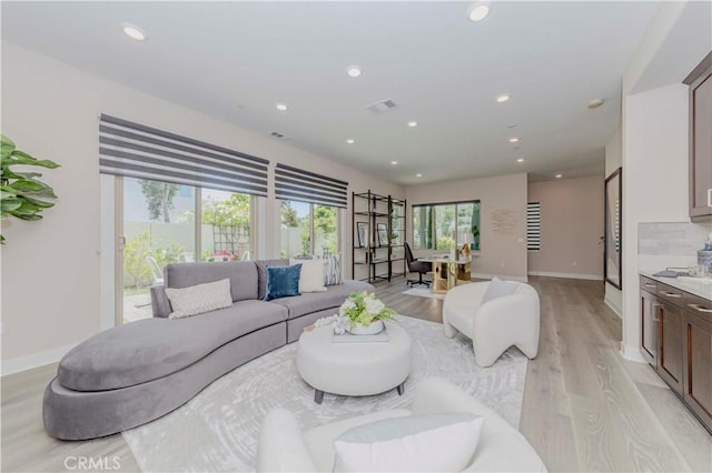195 Stellar, Irvine, CA 92618 - living area with light wood finished floors and recessed lighting