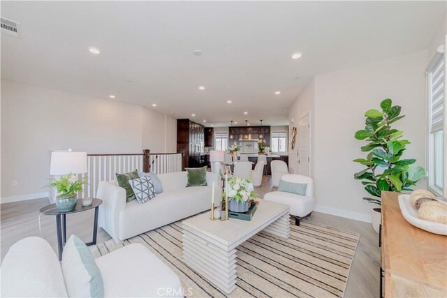 195 Stellar, Irvine, CA 92618 - living area with recessed lighting and light wood-type flooring