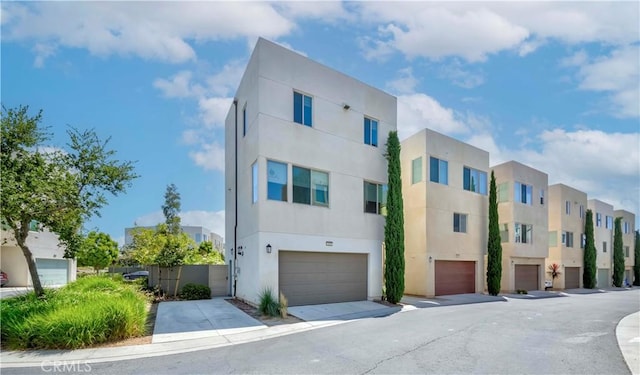 195 Stellar, Irvine, CA 92618 - view of front of property with stucco siding, a residential view, and a garage