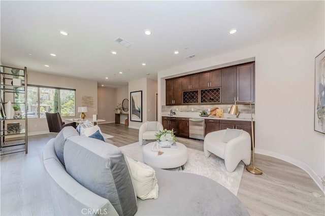 195 Stellar, Irvine, CA 92618 - living area with recessed lighting and light wood-style floors