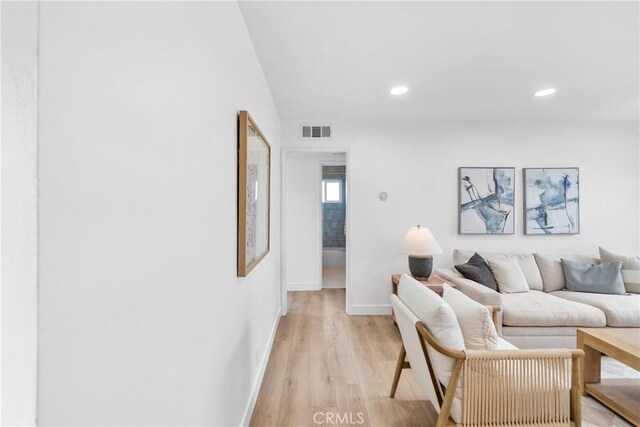 13141 Willamette St, Westminster, CA 92683 - living room featuring light wood-style flooring and recessed lighting