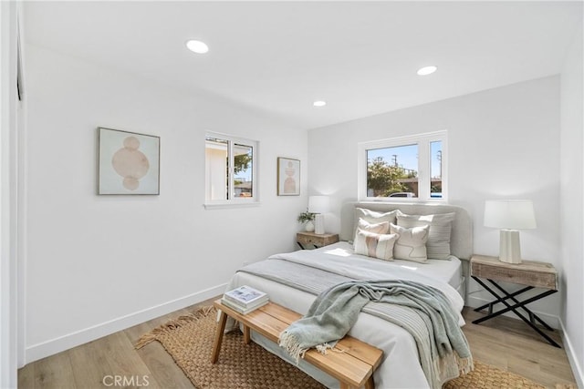 13141 Willamette St, Westminster, CA 92683 - bedroom with multiple windows, light wood-style flooring, and recessed lighting