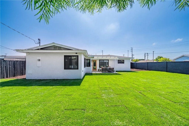 13141 Willamette St, Westminster, CA 92683 - rear view of house with stucco siding, a fenced backyard, and a patio area