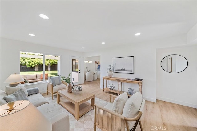 13141 Willamette St, Westminster, CA 92683 - living room featuring light wood-style floors and recessed lighting