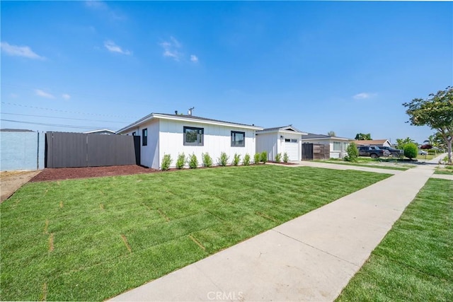 13141 Willamette St, Westminster, CA 92683 - view of front of house with driveway, a garage, and board and batten siding
