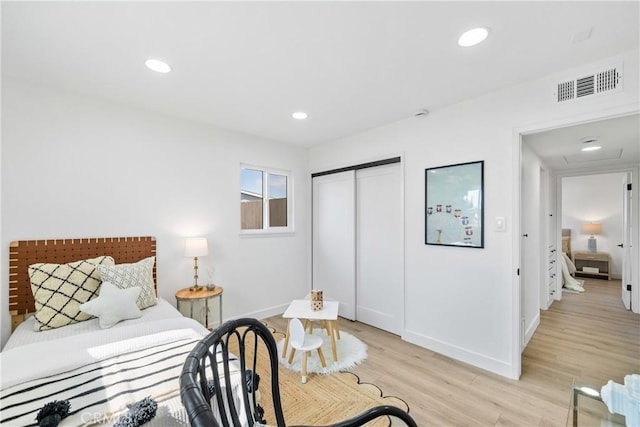 13141 Willamette St, Westminster, CA 92683 - bedroom with light wood-type flooring, a closet, and recessed lighting