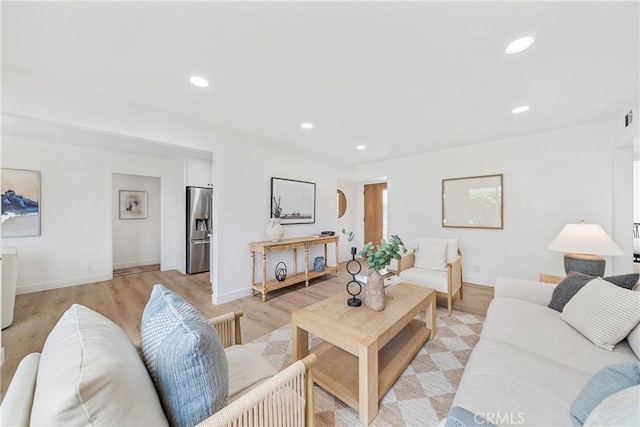 13141 Willamette St, Westminster, CA 92683 - living room featuring recessed lighting and light wood-style floors