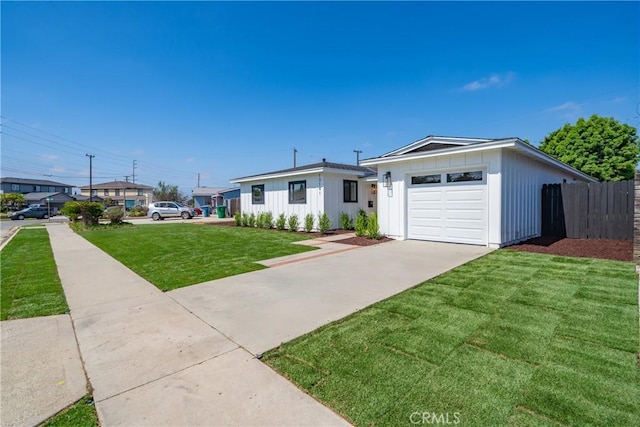 13141 Willamette St, Westminster, CA 92683 - view of front of property featuring board and batten siding and driveway