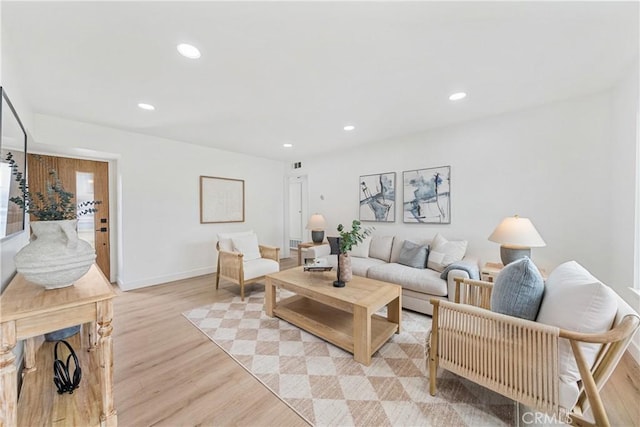 13141 Willamette St, Westminster, CA 92683 - living room with light wood-type flooring and recessed lighting