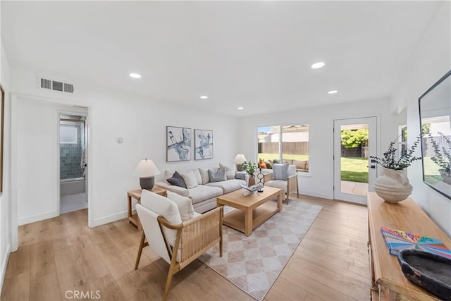 13141 Willamette St, Westminster, CA 92683 - living area featuring light wood finished floors and recessed lighting