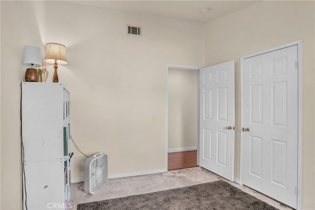 21803 Heliotrope Ln, Wildomar, CA 92595 - unfurnished bedroom featuring carpet and baseboards