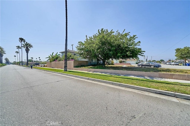 7961 La Corona Way, Buena Park, CA 90620 - view of asphalt street featuring curbs and sidewalks