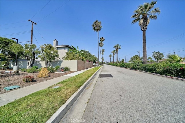 7961 La Corona Way, Buena Park, CA 90620 - view of asphalt street featuring curbs and sidewalks
