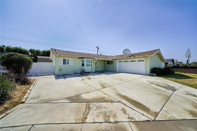 7961 La Corona Way, Buena Park, CA 90620 - ranch-style home featuring an attached garage, concrete driveway, and stucco siding
