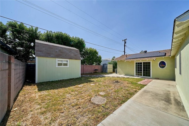 7961 La Corona Way, Buena Park, CA 90620 - fenced backyard featuring a shed and a patio area